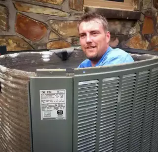 Brad really gets into his AC repair work