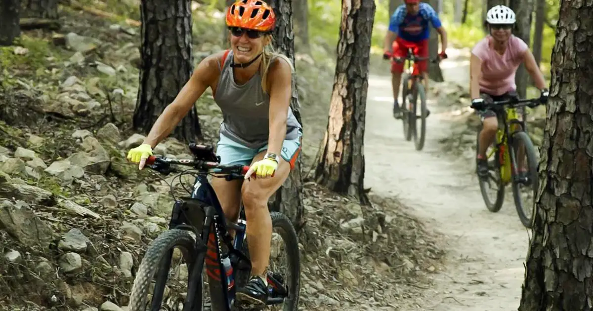 Bike riders on a trail through one of Arkansas' beautiful state parks.